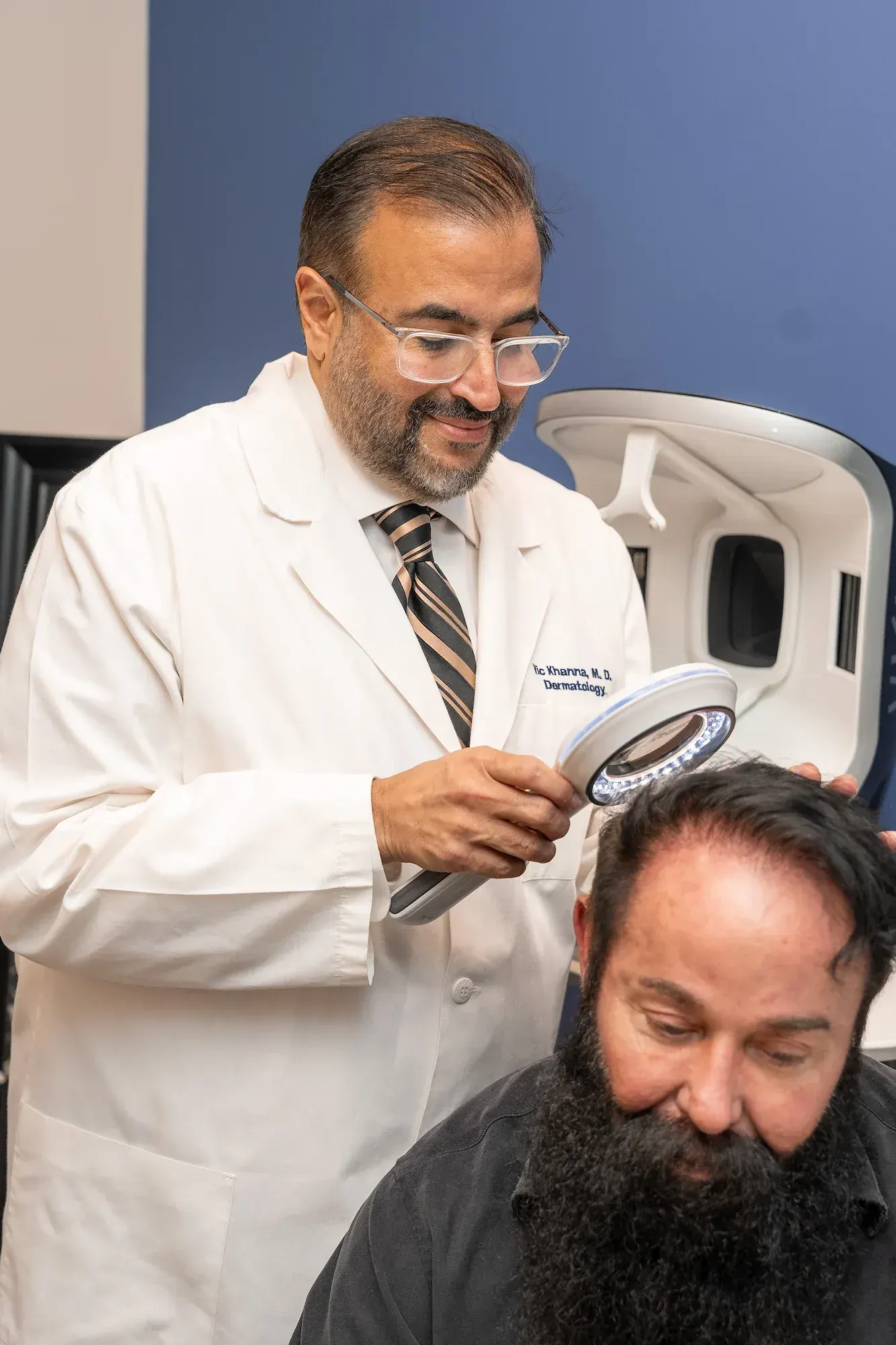 Confident male patient evaluating finasteride candidacy with DSI Hair dermatologist