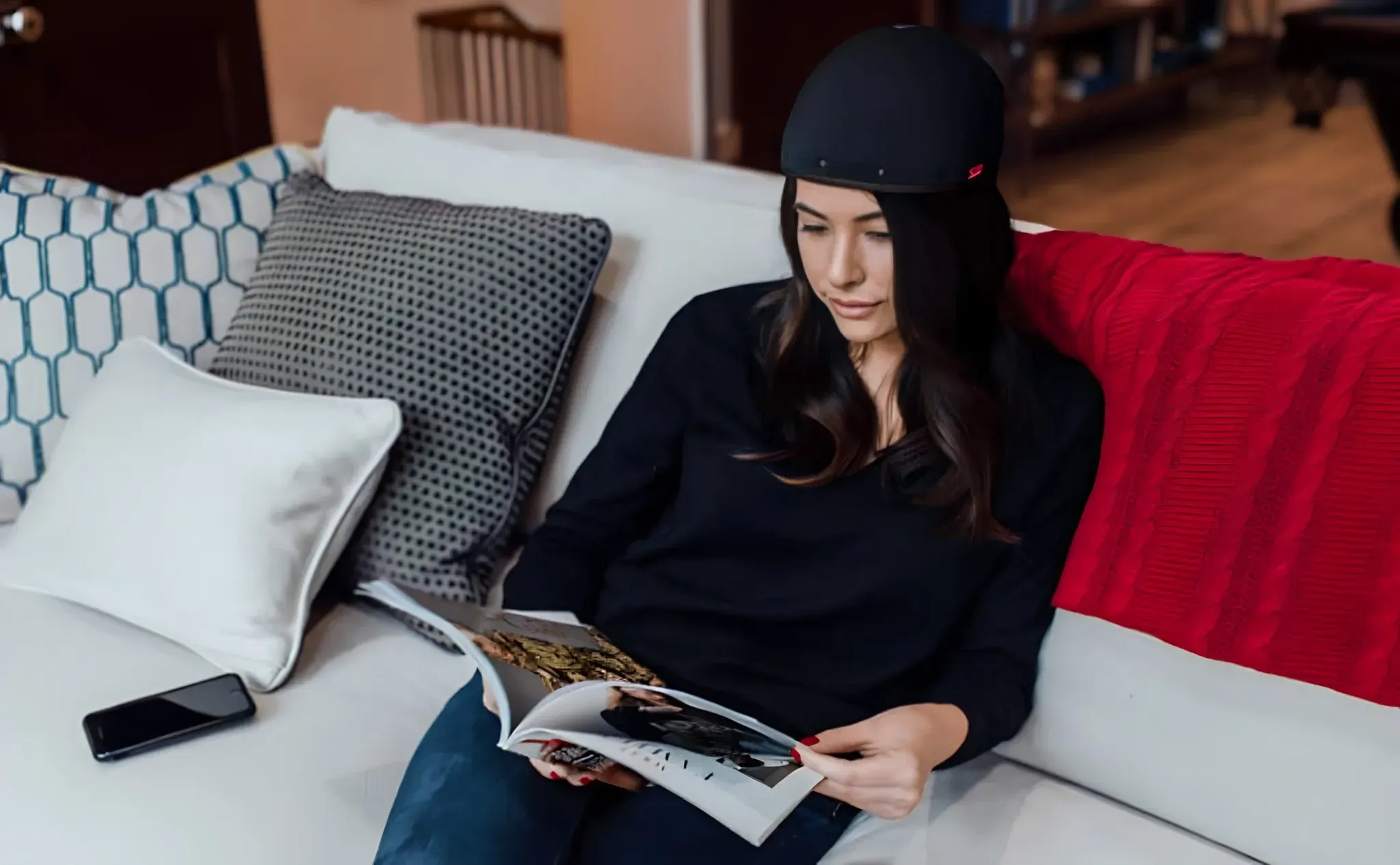 Patient wearing Revian laser cap for hair growth at DSI Hair in Algonquin, IL