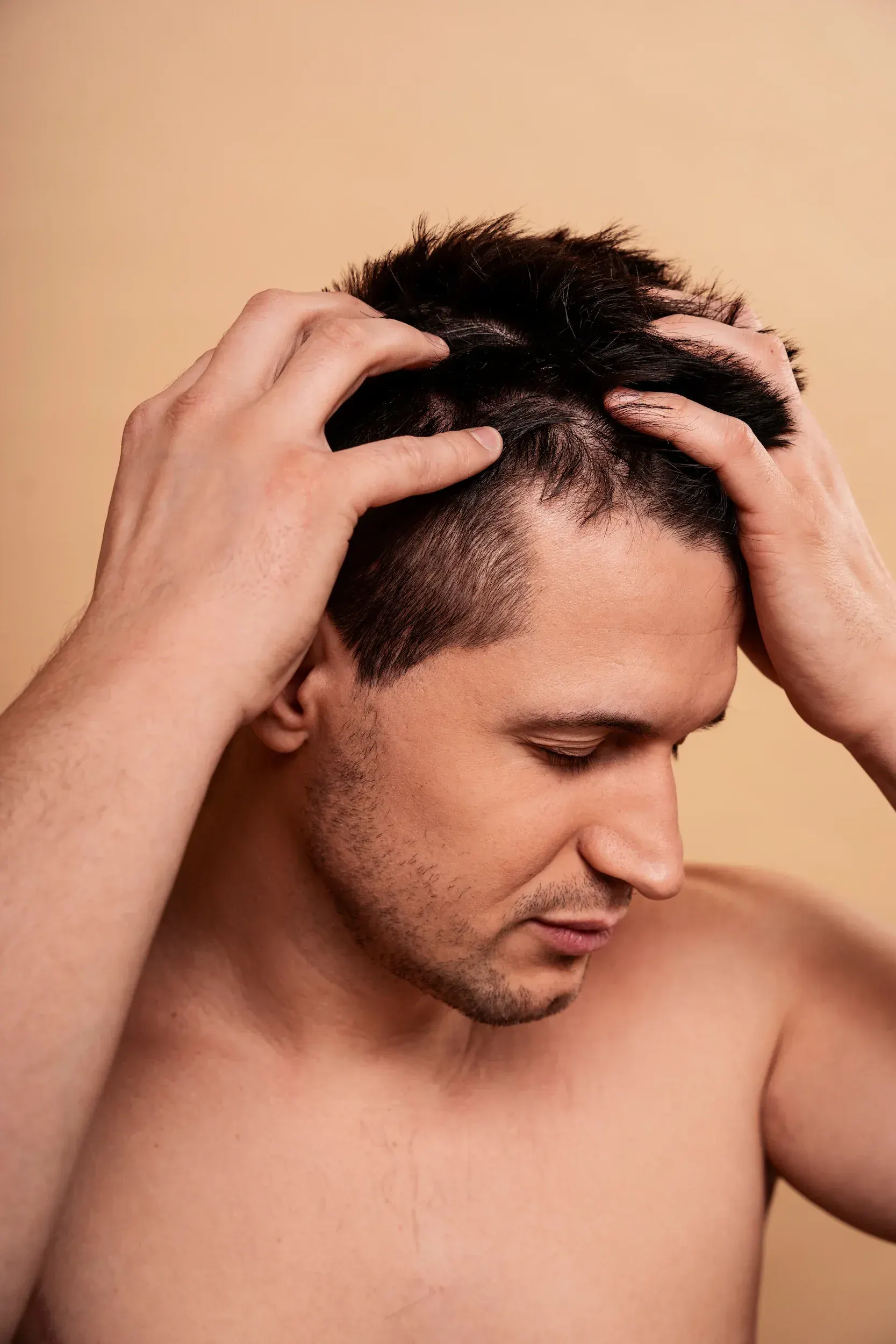 Patient reviewing minoxidil hair regrowth results with DSI Hair dermatologist
